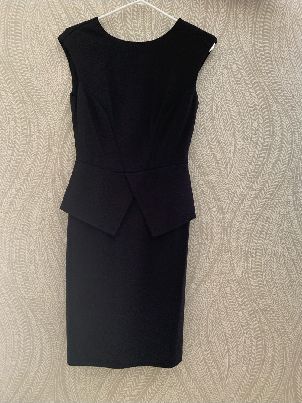 Classic Black Peplum Zip-back Dress